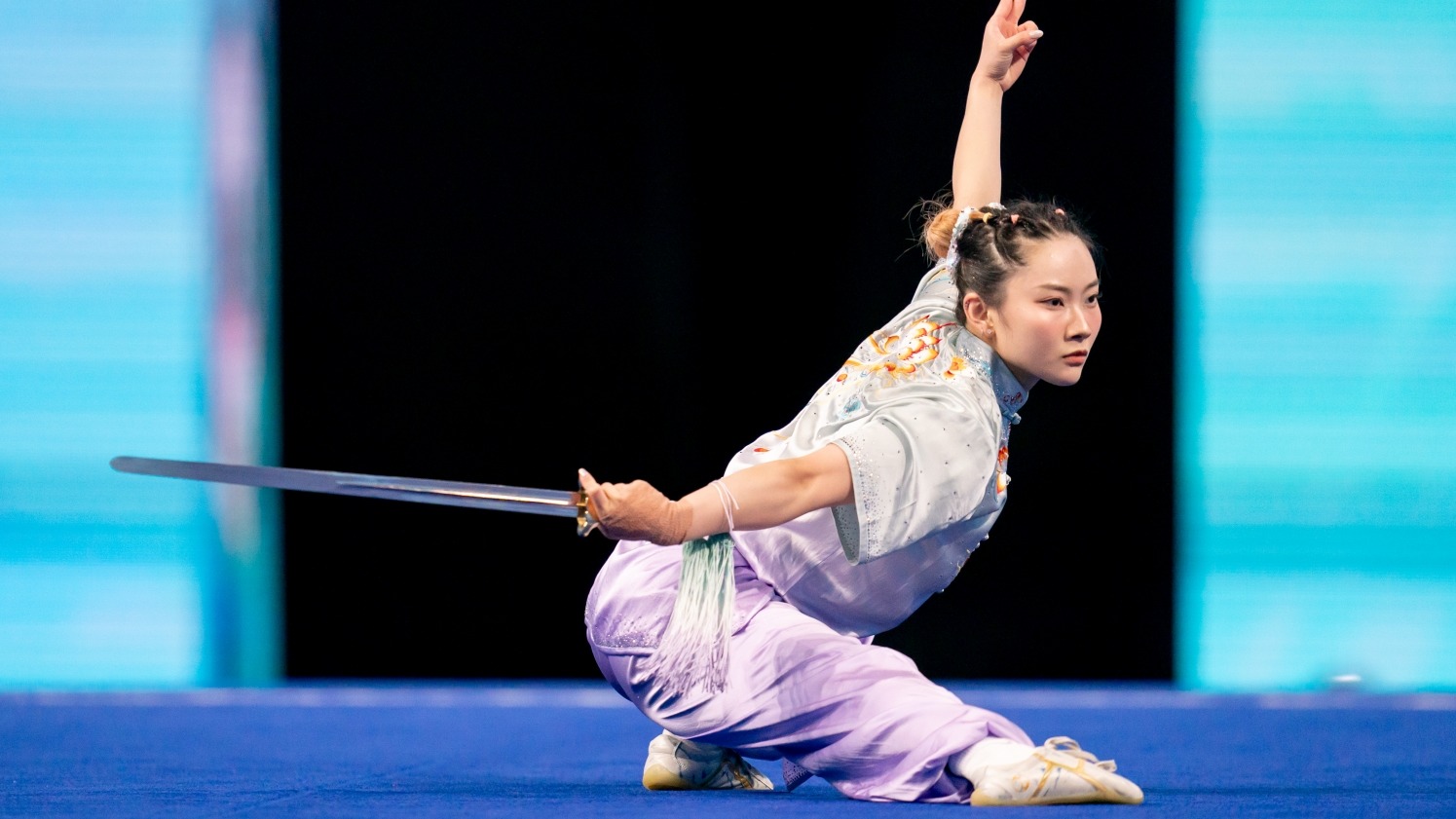 沈晓榆于成都举行的第十二届世界运动会武术女子长拳剑术枪术全能项目夺金 (2025) 相片: 中国香港体育协会暨奥林匹克委员会