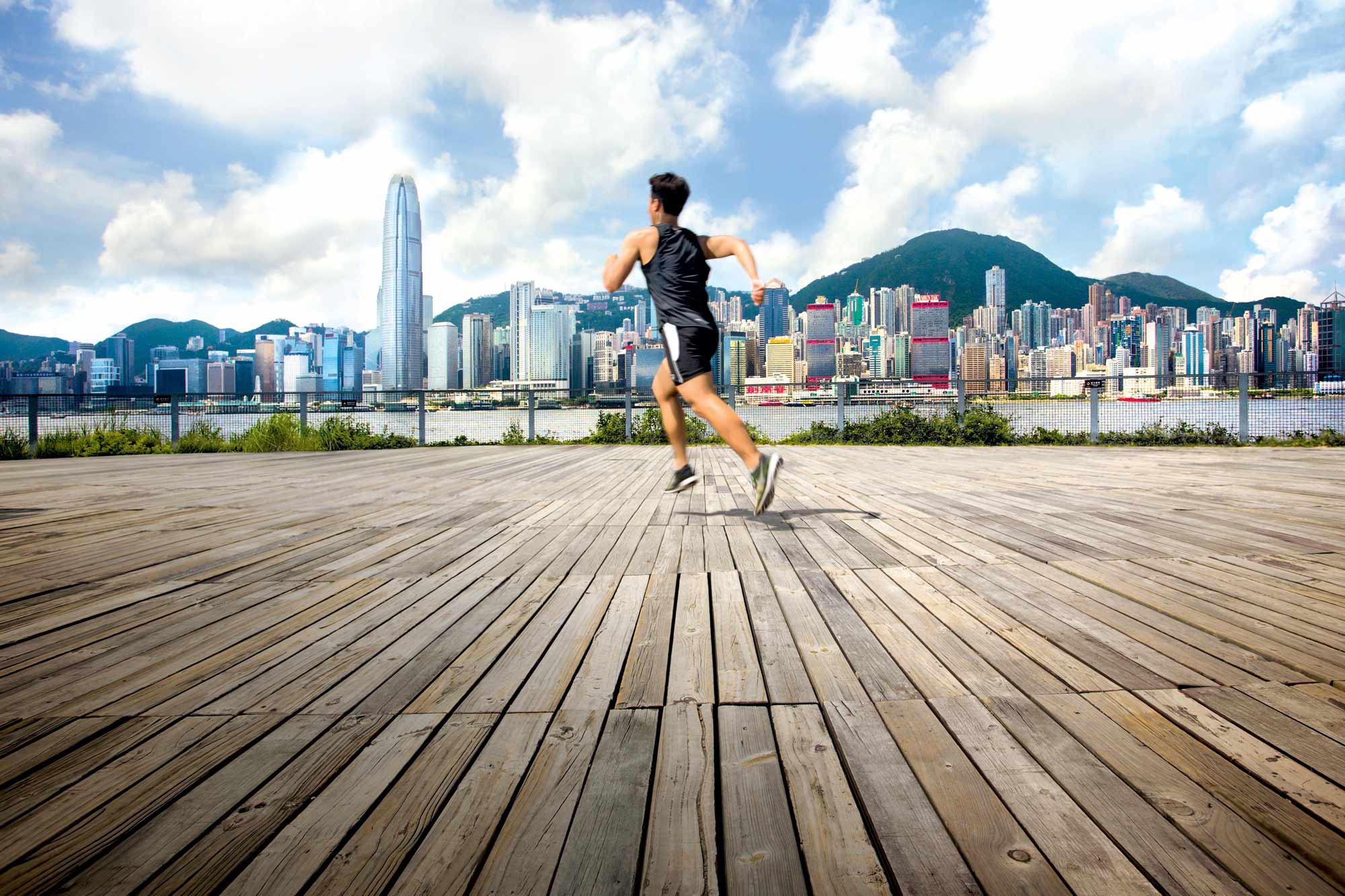 A man running at Hong Kong Victoria Harbour Walk