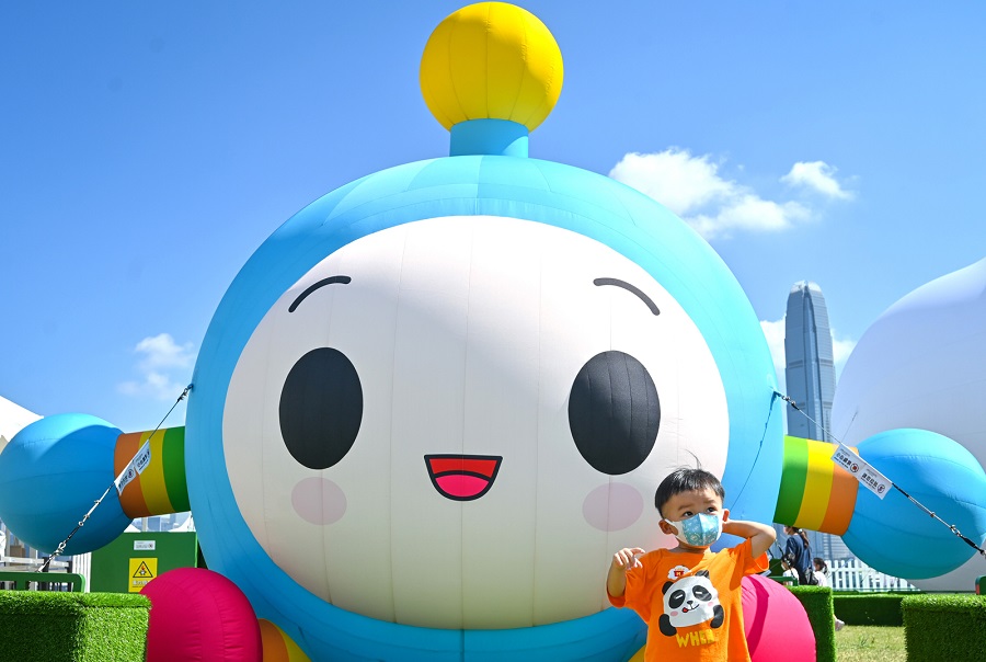 Meet and greet Hug Bug, the colourful and lovable character at the West Kowloon Cultural District Art Park.