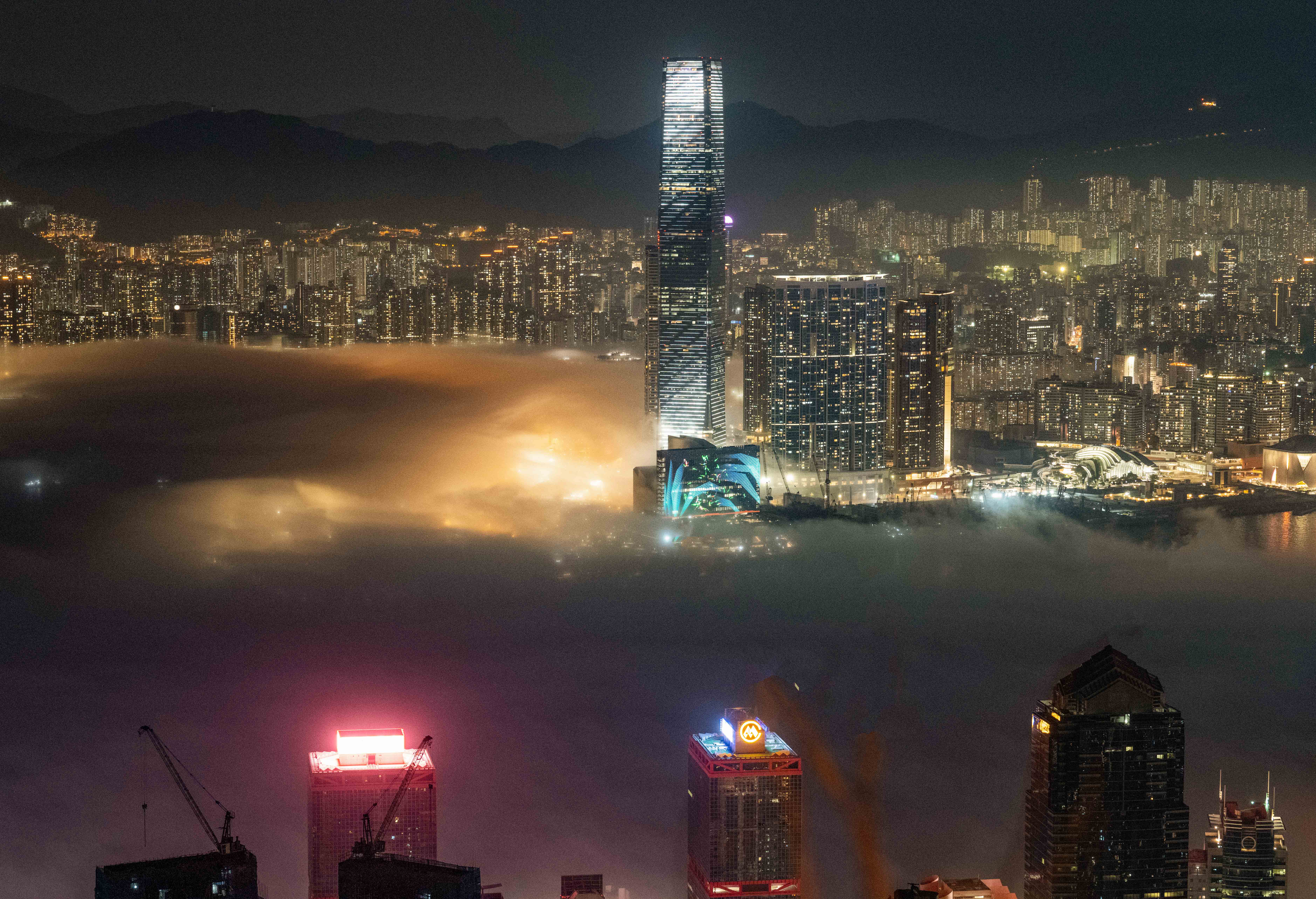 Cityscape under blanket of fog (2023)